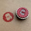 Voorbeeld van een laser cut stempel letter A in rode inkt